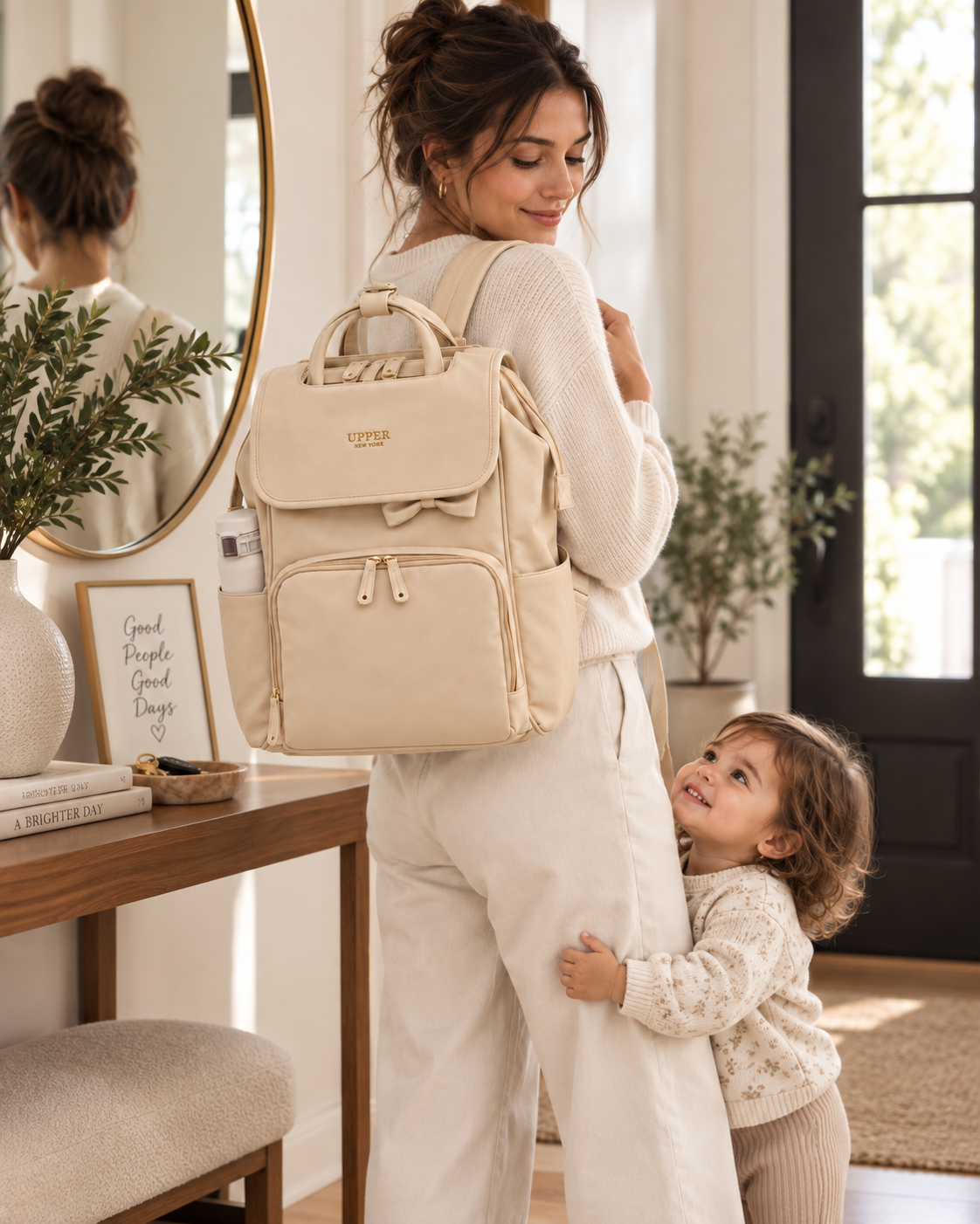 Commuter 23 everyday backpack worn by a mom with her toddler heading out on the commute