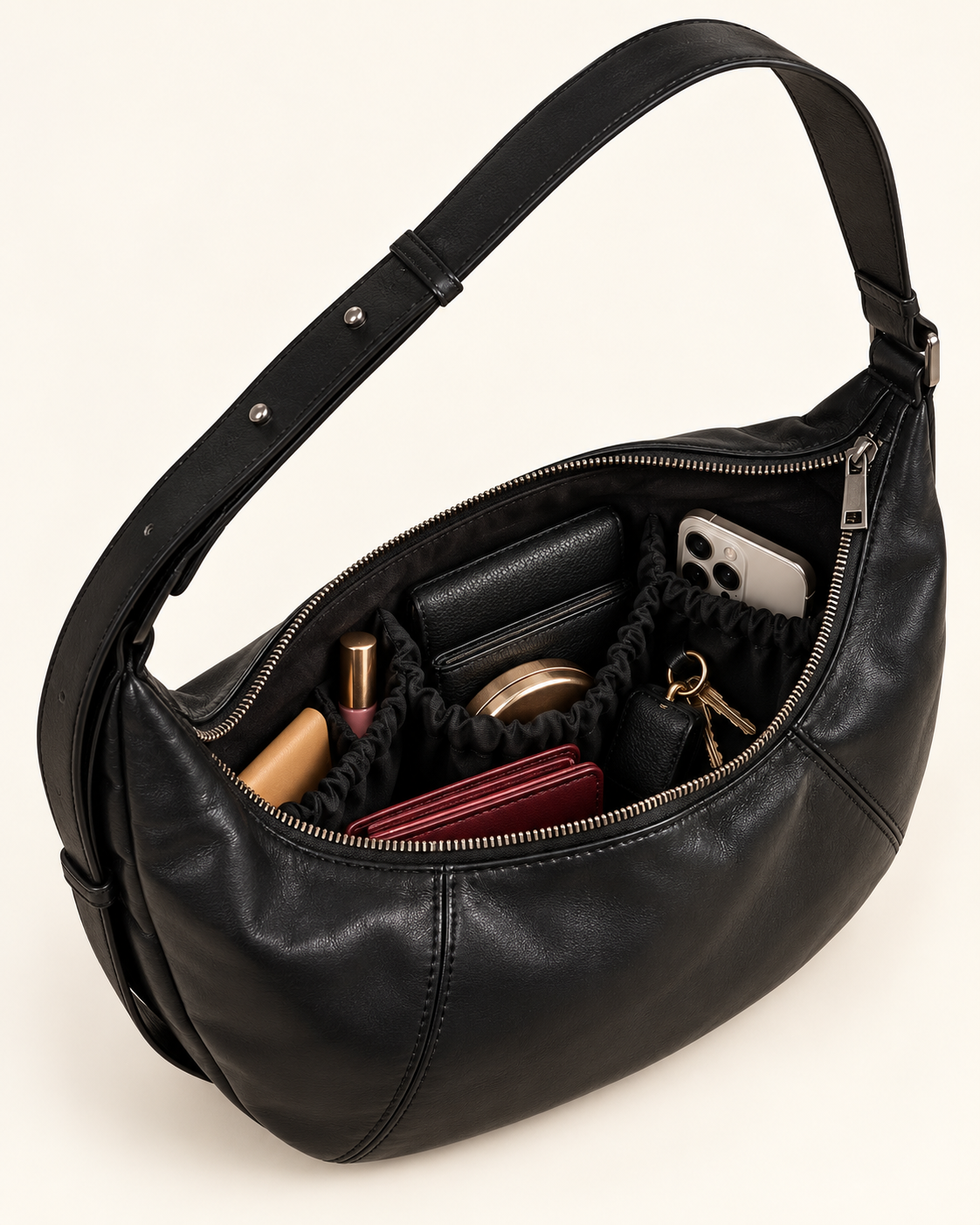 Rivage crossbody for moms open to show phone, wallet and essentials inside