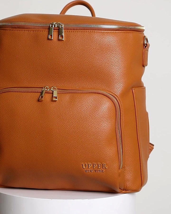 Harvey everyday backpack for parents in caramel vegan leather, front view